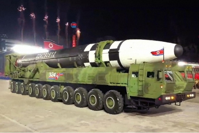 North Korea Displays New ICBM in Night Military Parade