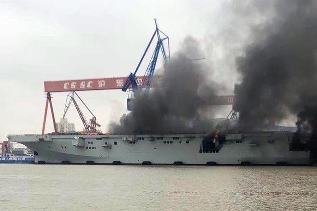Fire in Under-construction Chinese Helicopter Carrier 